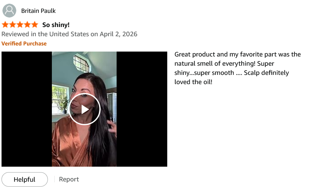 Amazon review by Britain Paulk, 5 stars, Verified Purchase, April 2 2026 — “So shiny!”: Great product and my favorite part was the natural smell of everything! Super shiny...super smooth .... Scalp definitely loved the oil! Includes a customer video.